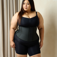 Latex waist trainer on plus size woman